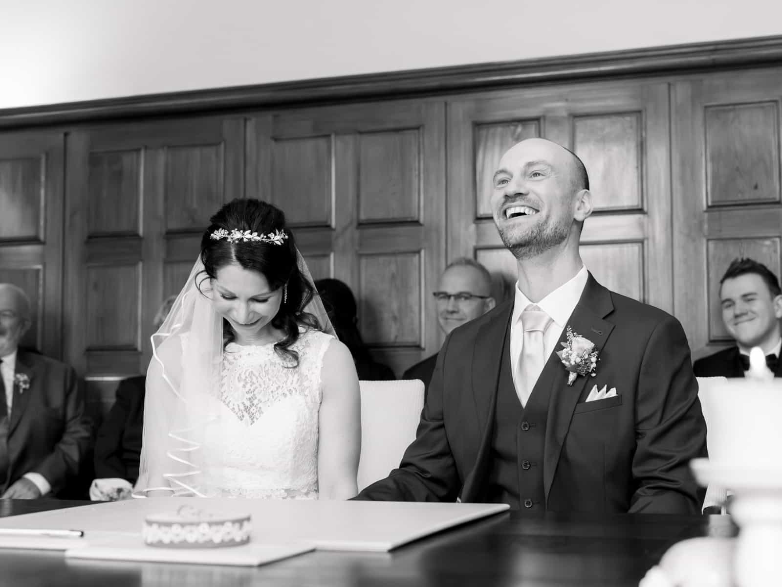 Couple signing during ceremony