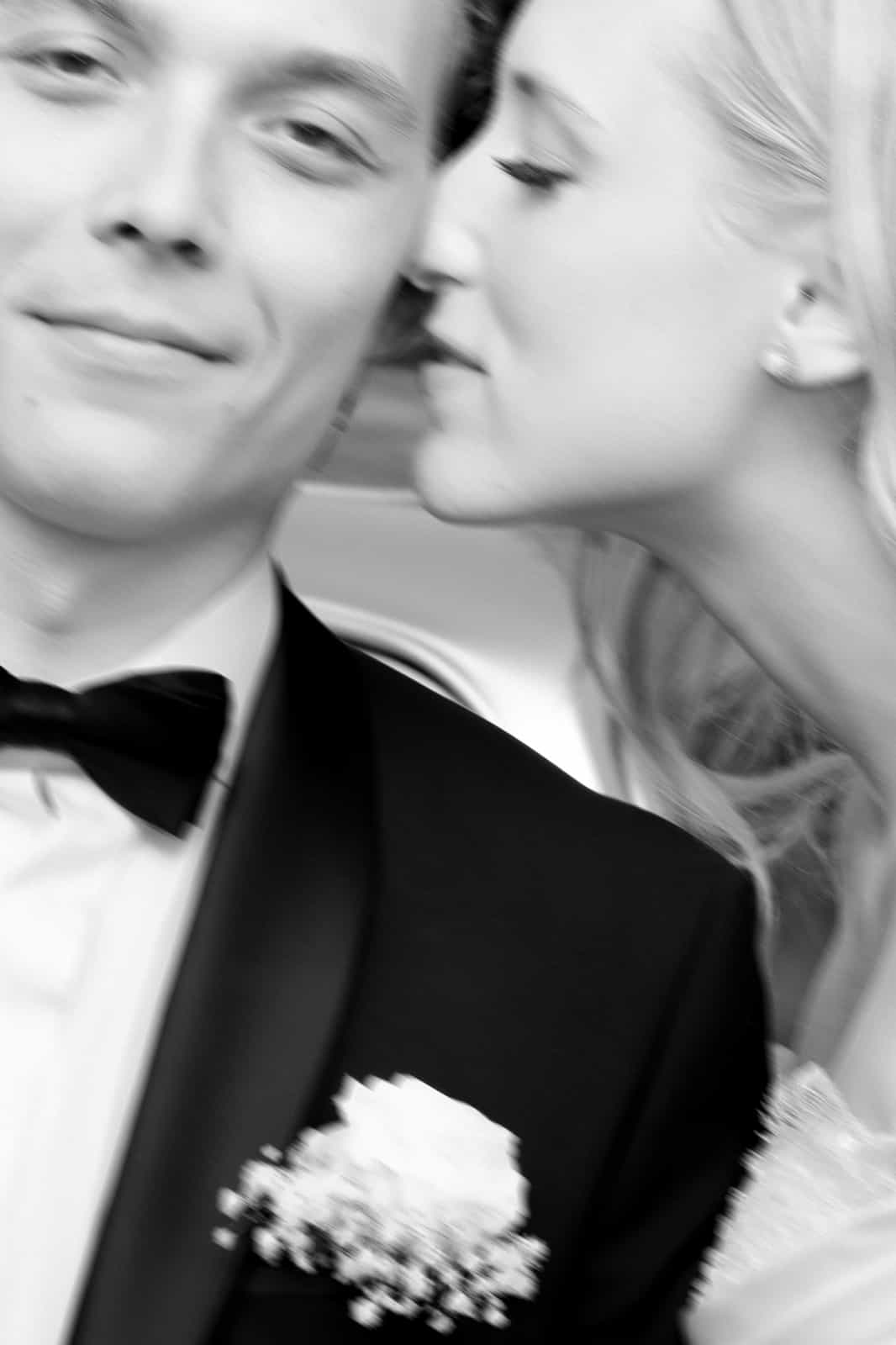 Intimate couple portrait with artistic motion blur, black and white