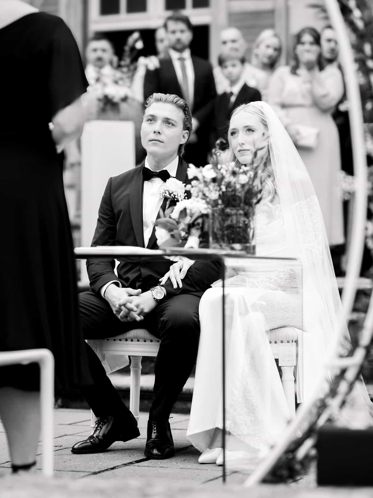 Castle wedding photography Schloss Kartzow - couple holding hands during ceremony Berlin Brandenburg