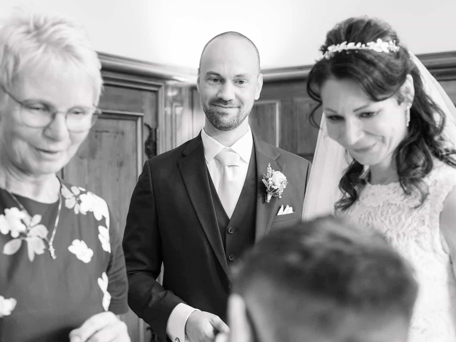 Couple with mother in elegant black and white portrait