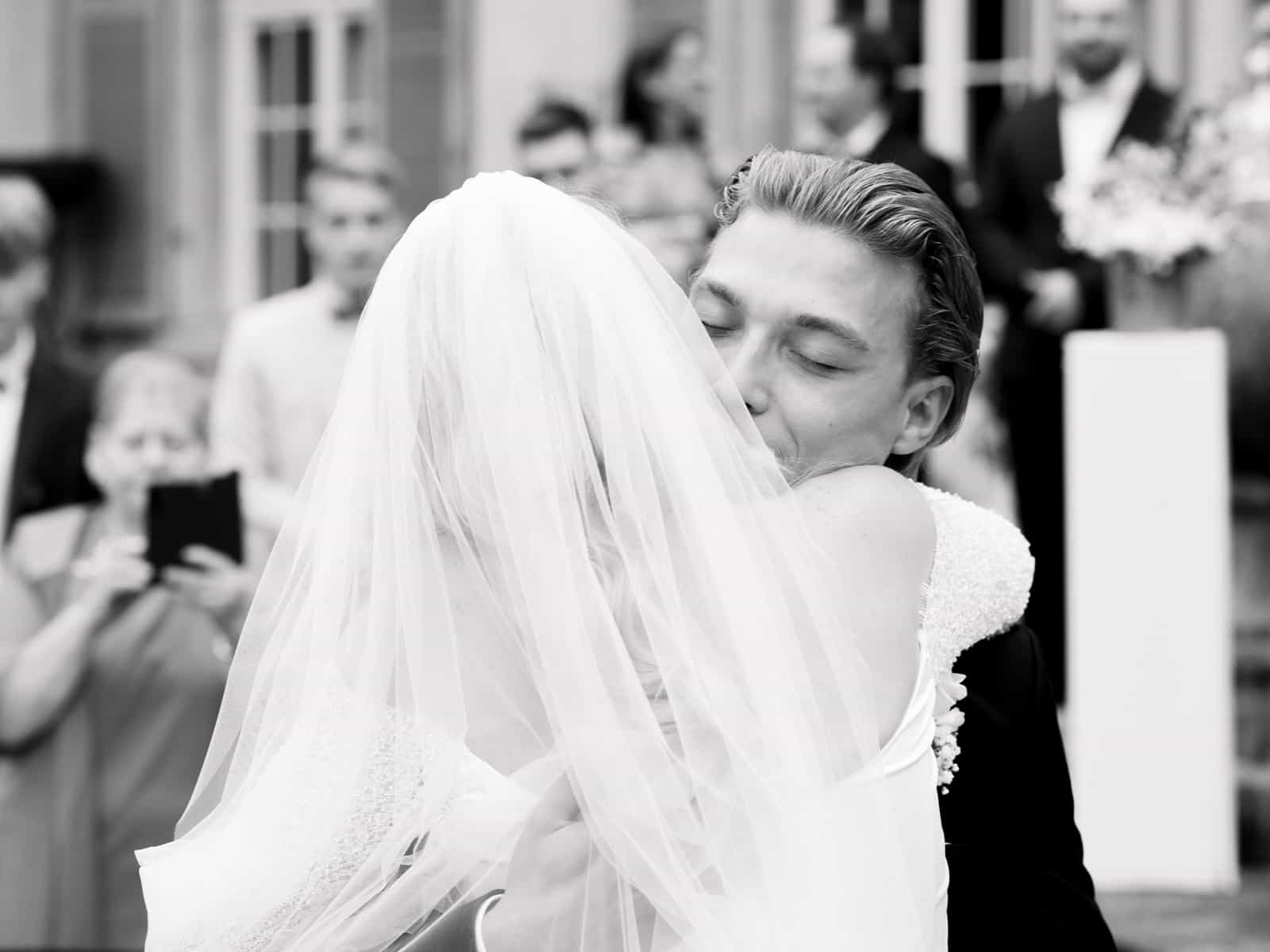 Castle wedding photography Schloss Kartzow - couple embracing after ceremony Berlin Brandenburg