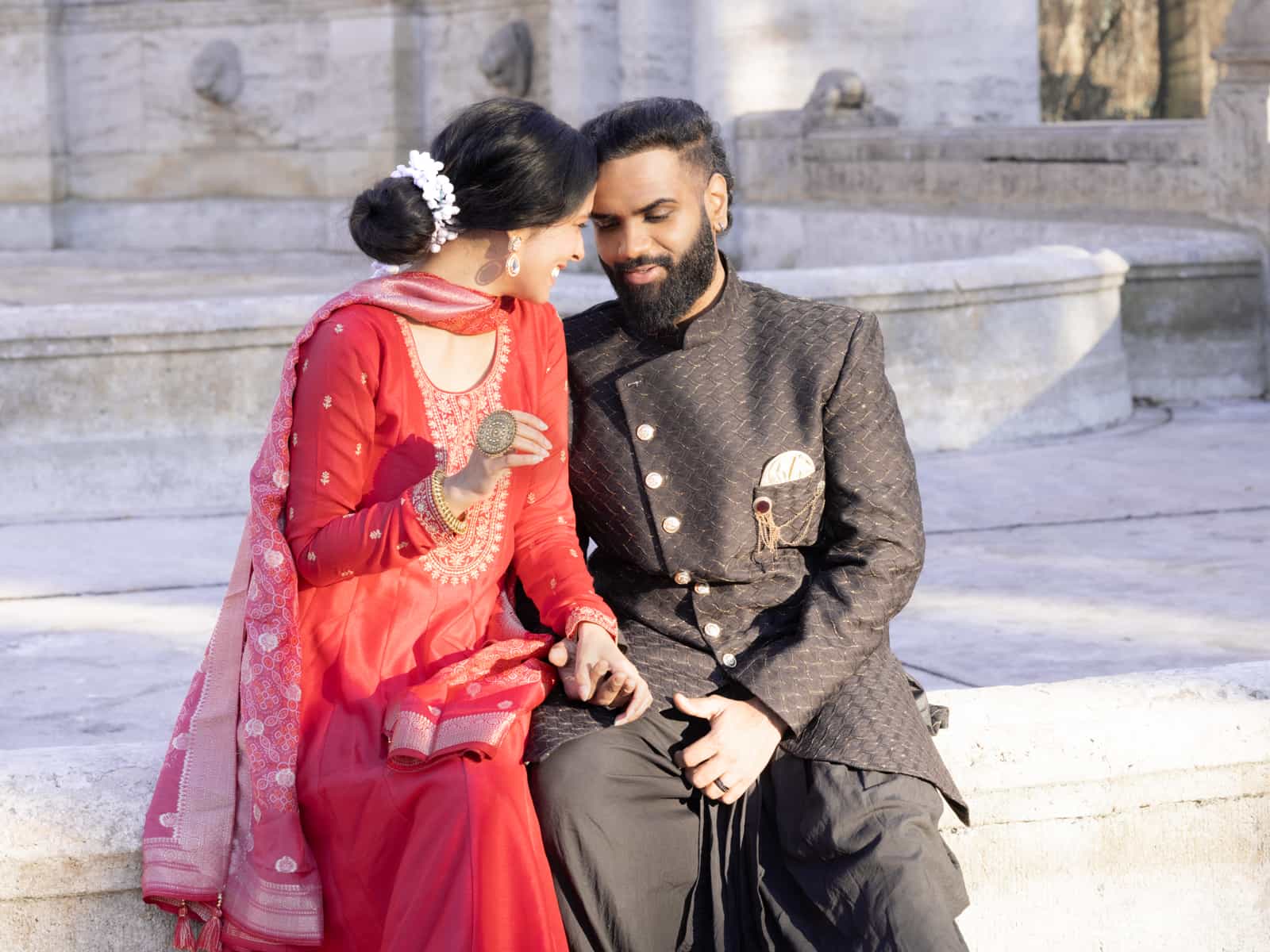 Close-up of Indian bridal couple in loving embrace