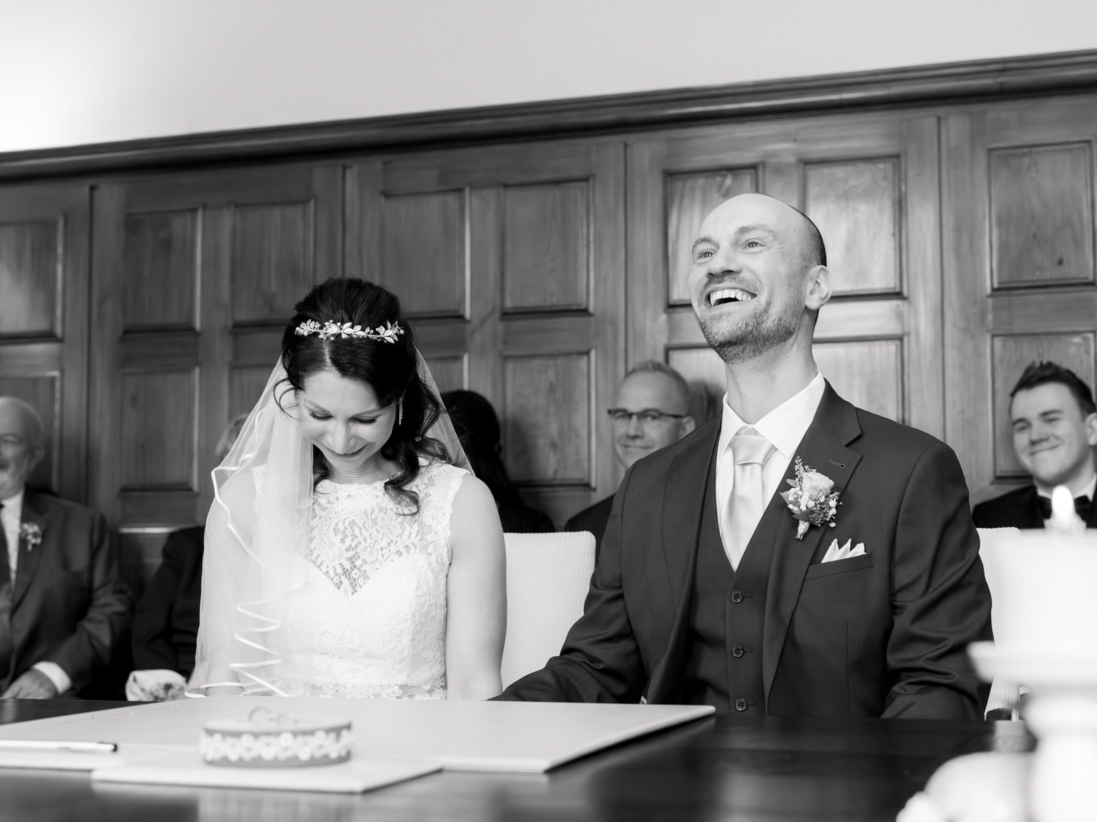 Couple signing during ceremony