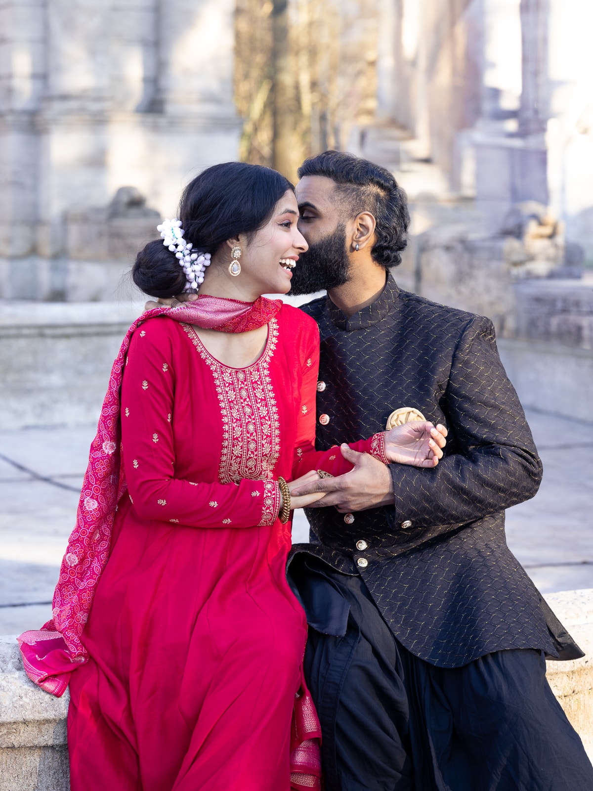 Romantic portrait of Indian bridal couple in warm light