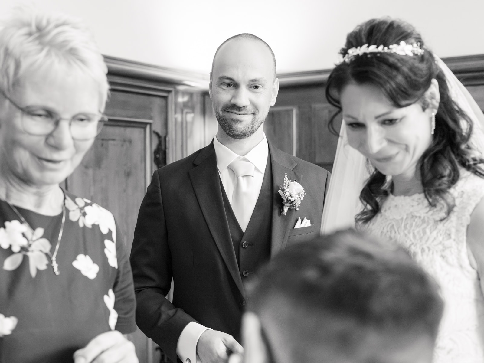 Couple with mother in elegant black and white portrait