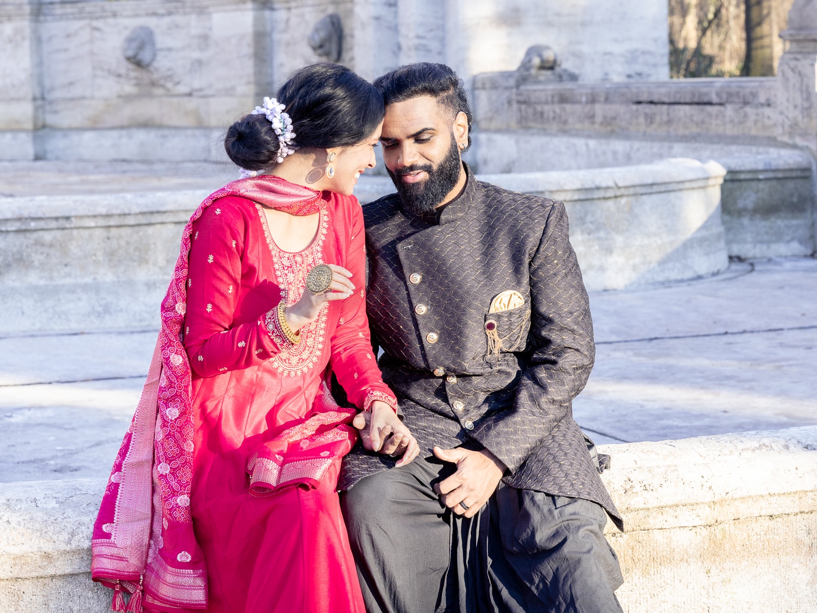 Close-up of Indian bridal couple in loving embrace