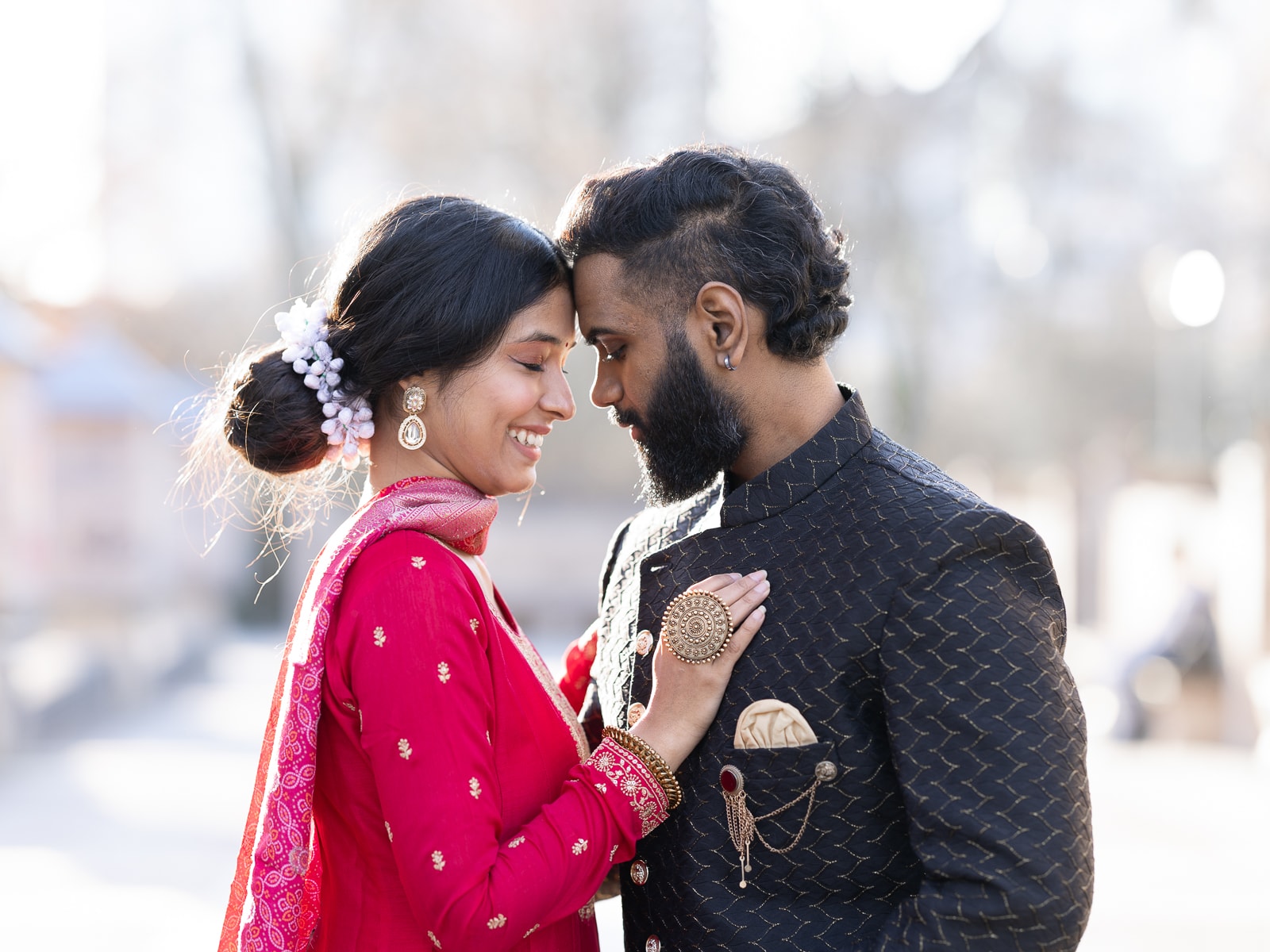Modern portrait of Indian bridal couple in urban park ambiance