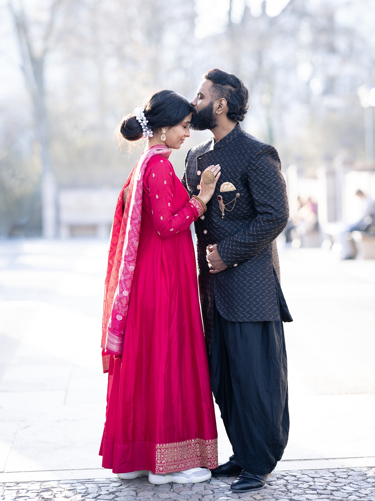 Proud Indian bridal couple in magnificent traditional wedding attire
