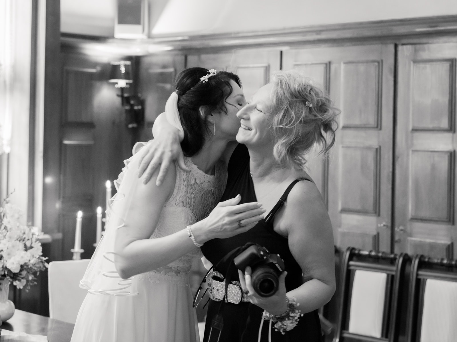 Photographer and bride sharing an emotional moment